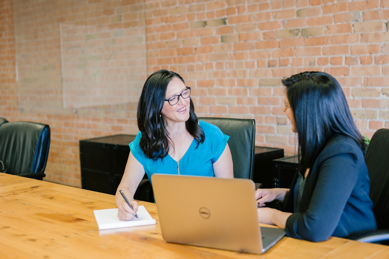 Two professionals having a natural, one-to-one financial consultation